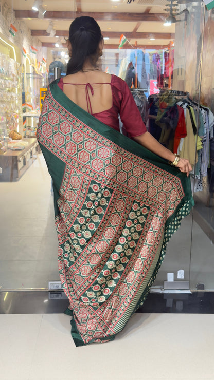 Elegant Dark Green Printed Silk Saree with Traditional Border