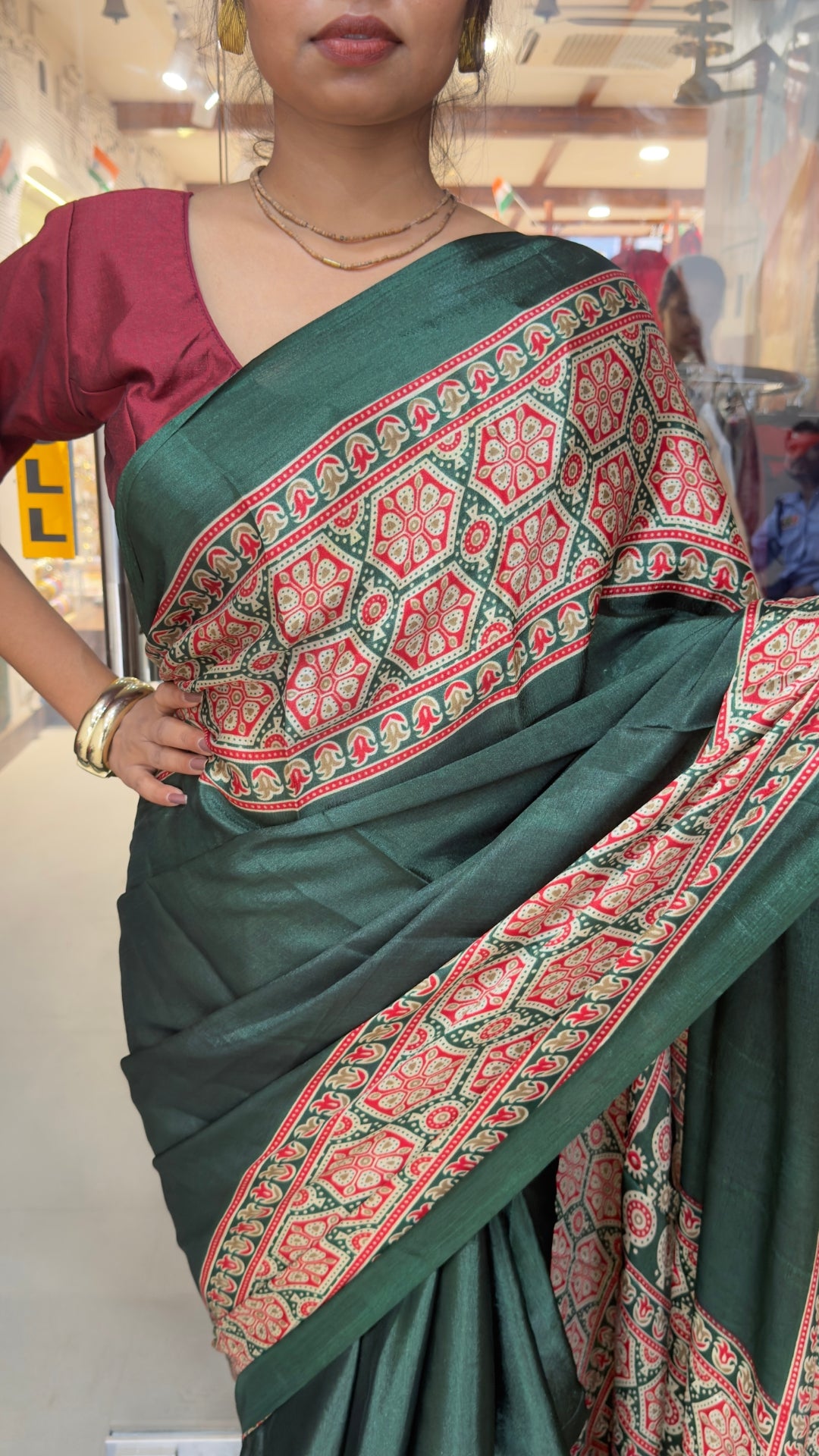Elegant Dark Green Printed Silk Saree with Traditional Border