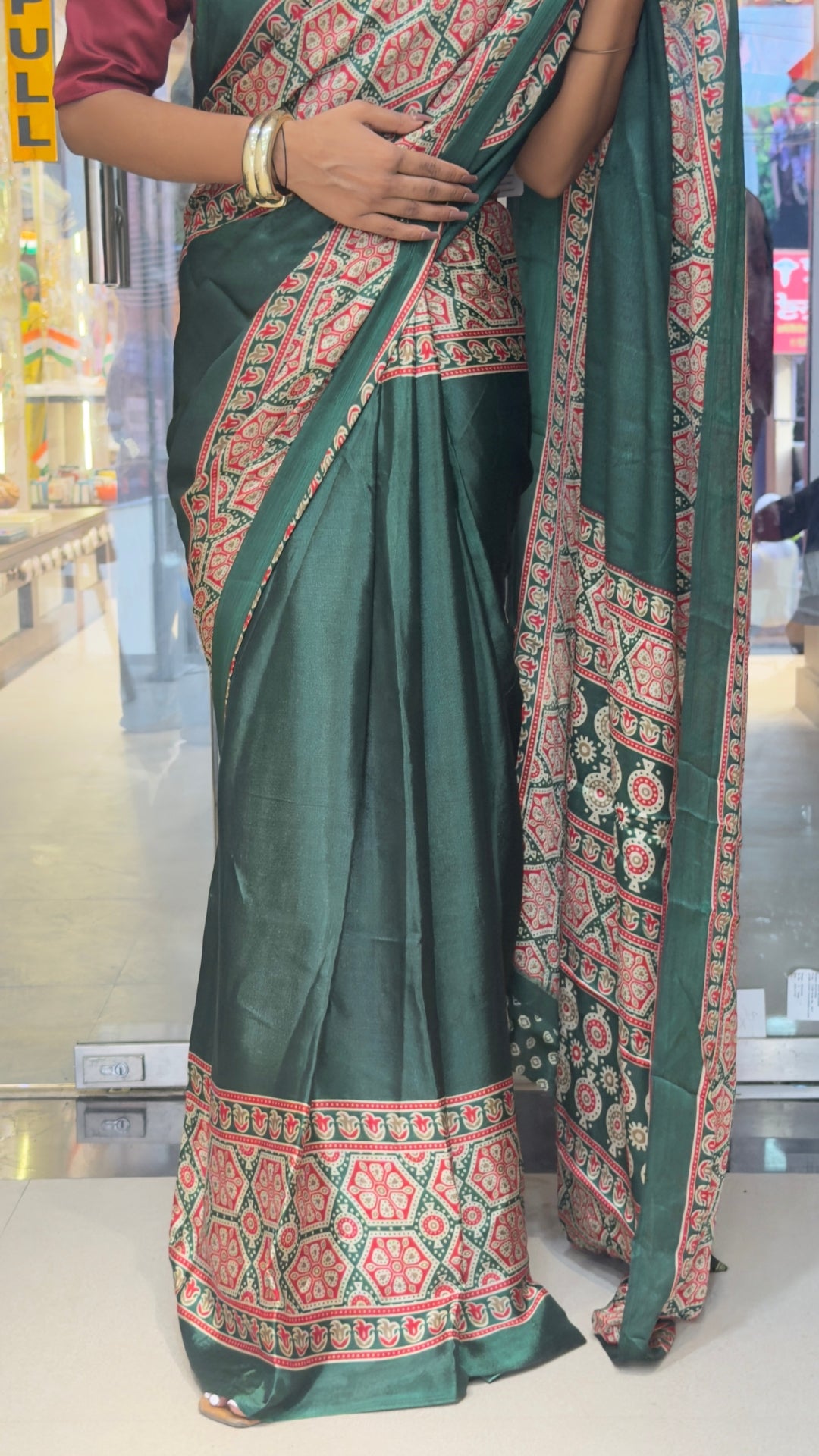 Elegant Dark Green Printed Silk Saree with Traditional Border