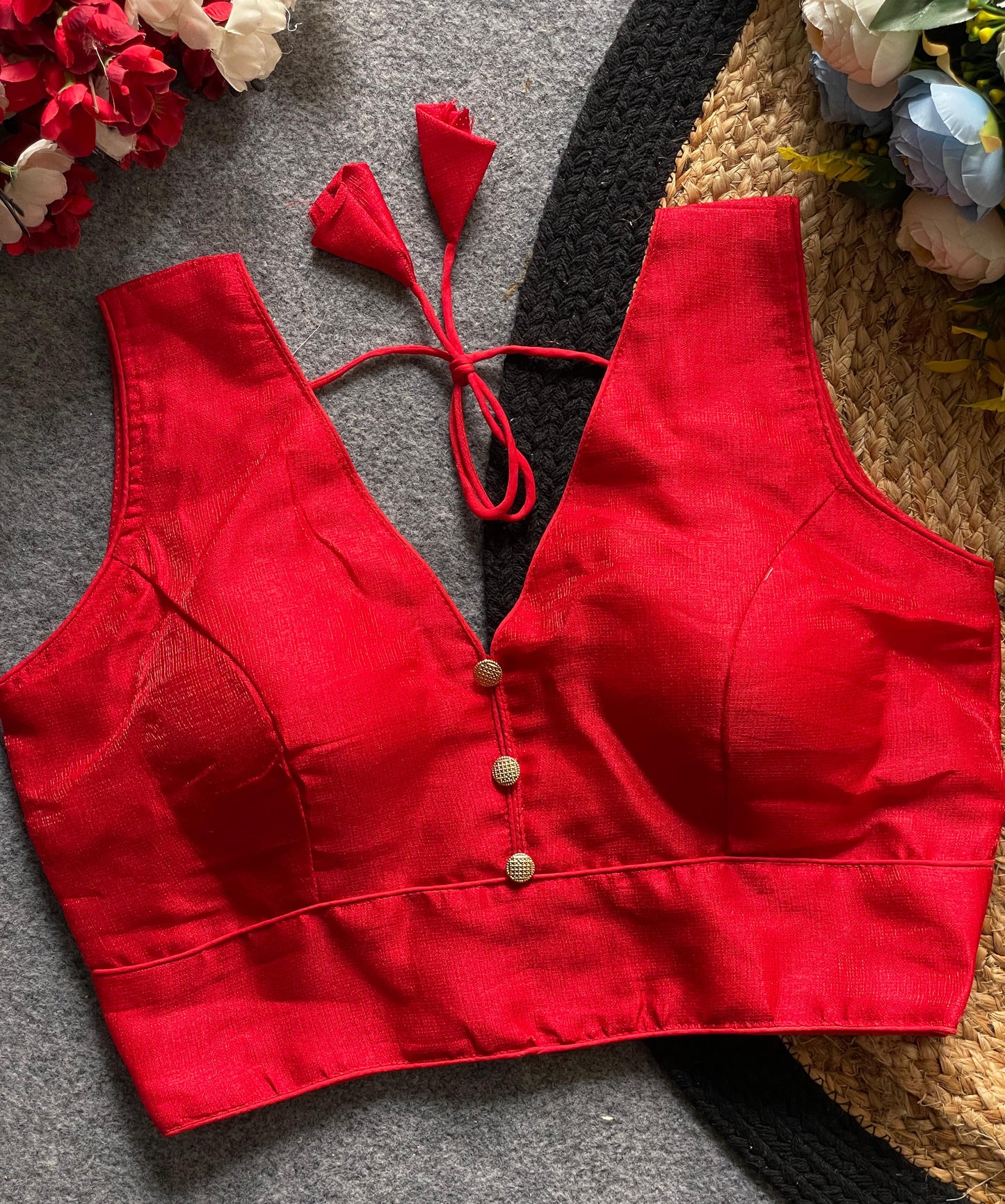 Readymade Sleeveless Blouse with Deep Neckline & Decorative Buttons