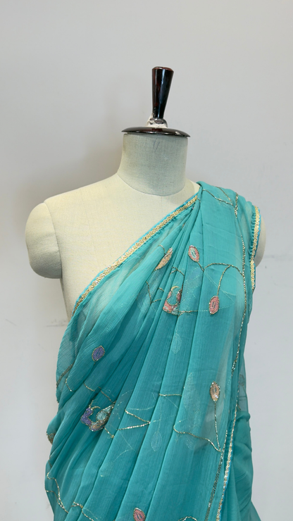 Banarashe Turquoise Blue Embroidered Saree with Floral Motifs & Golden Lace Border