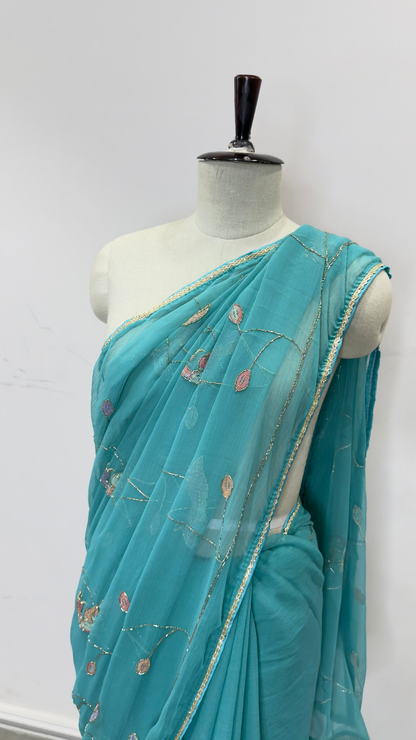 Banarashe Turquoise Blue Embroidered Saree with Floral Motifs & Golden Lace Border