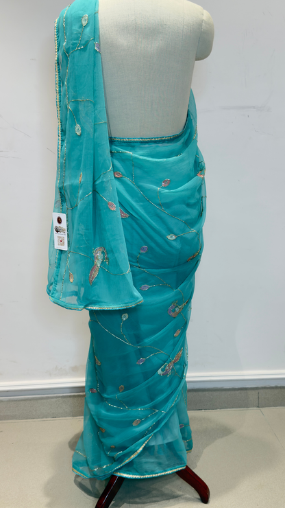 Banarashe Turquoise Blue Embroidered Saree with Floral Motifs & Golden Lace Border