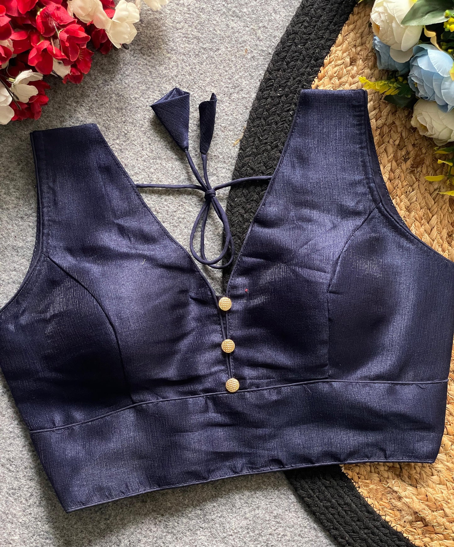 Readymade Sleeveless Blouse with Deep Neckline & Decorative Buttons