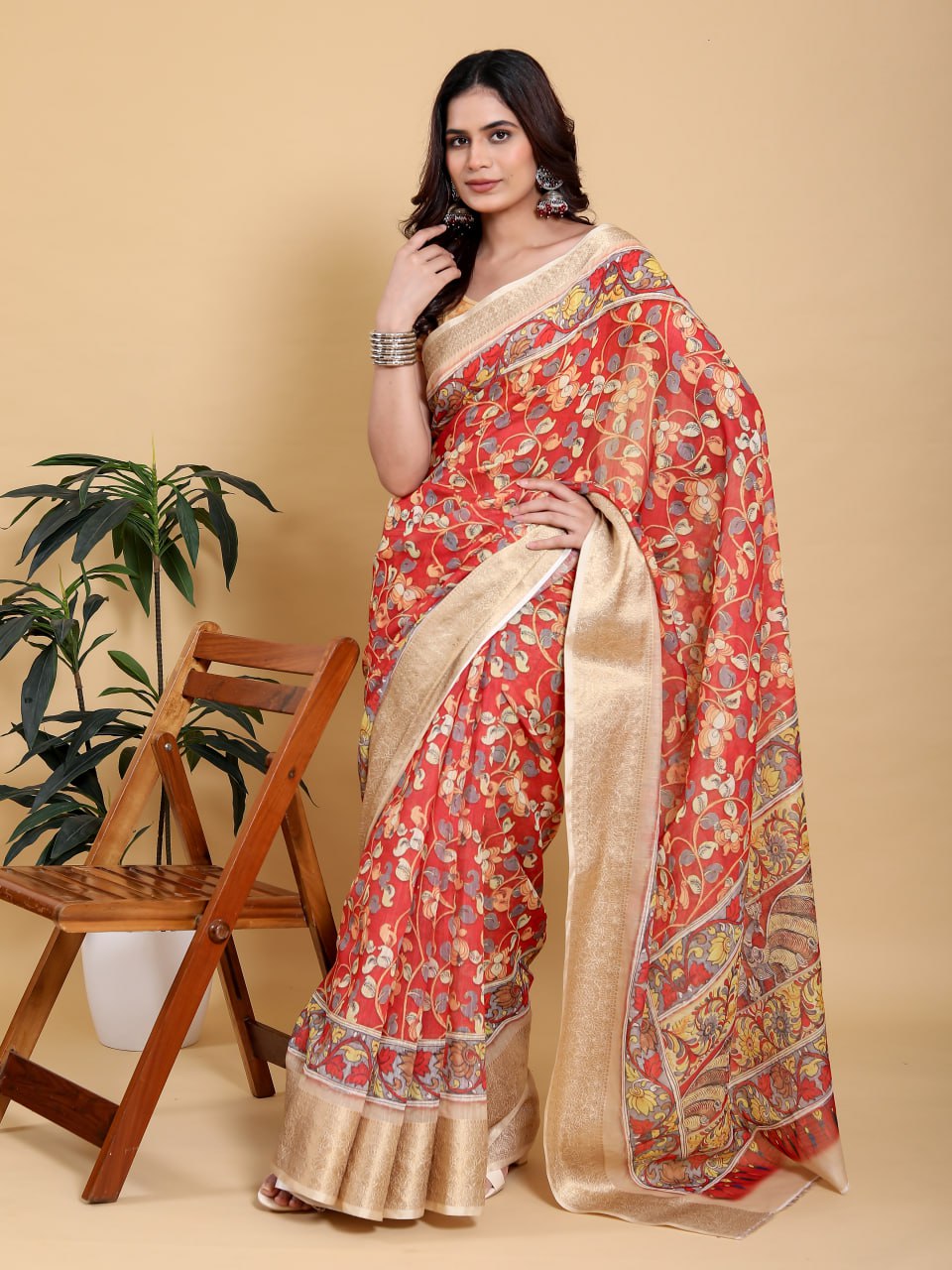 Vibrant Red Kalamkari Print Saree with Broad Zari Border