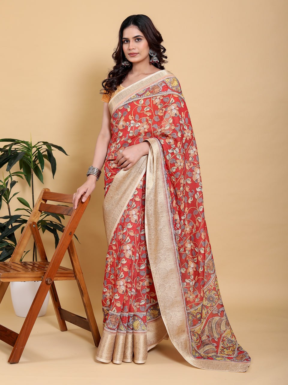 Vibrant Red Kalamkari Print Saree with Broad Zari Border