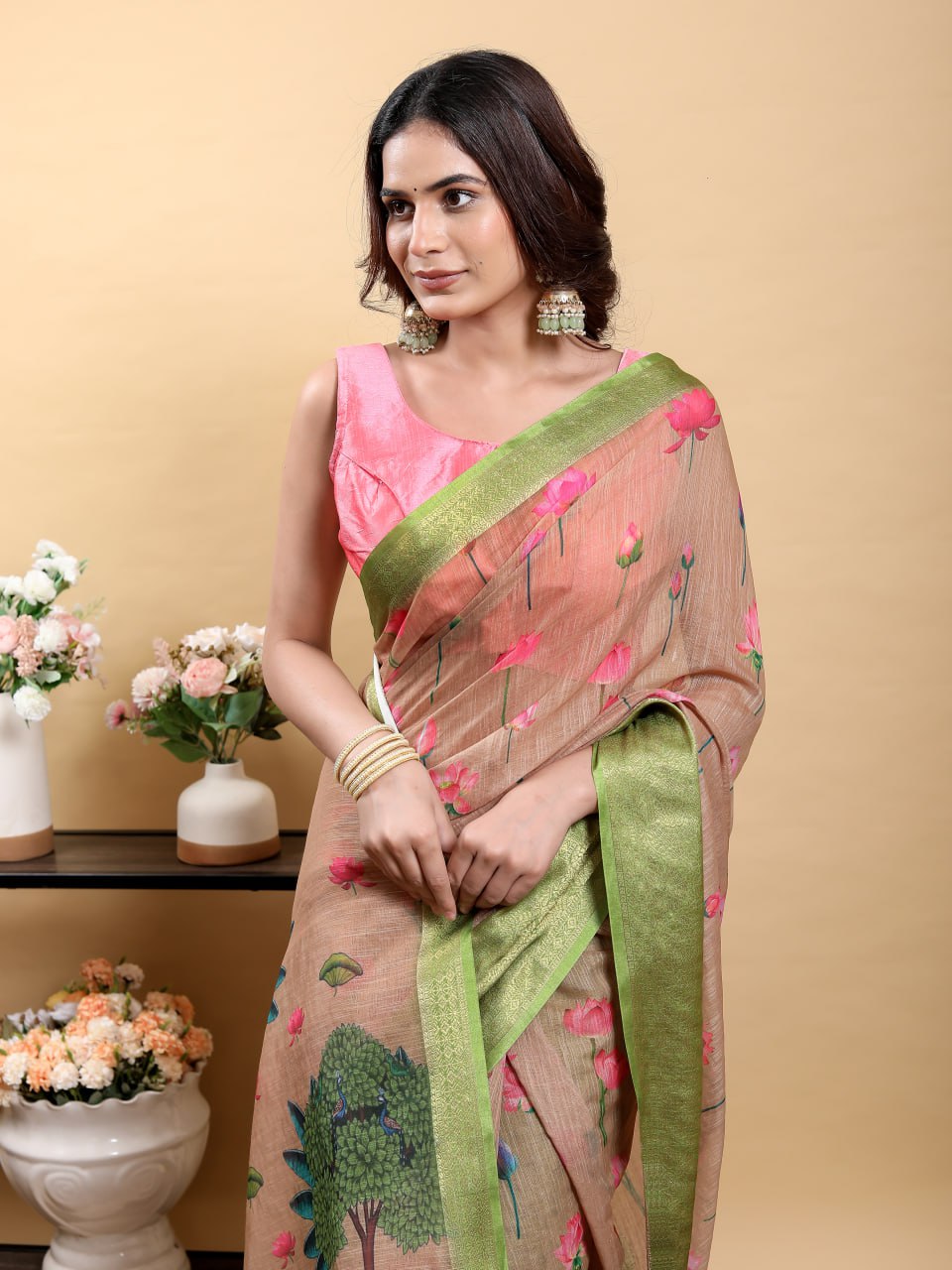Soft Peach/Brown Saree with Lotus Print and Contrast Green Zari Border