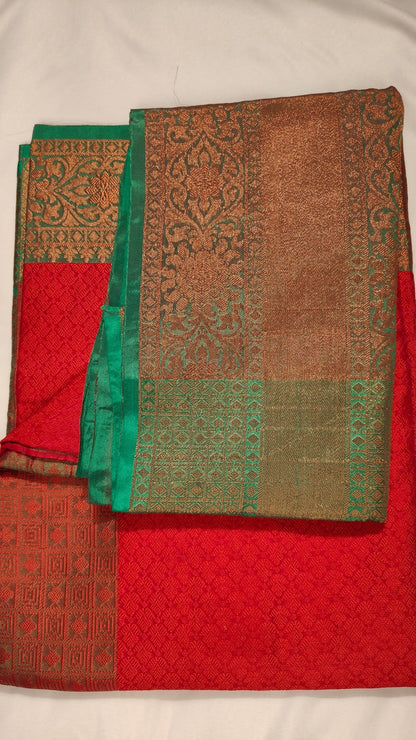 Vasanta Katan Silk Saree – A Celebration in Rust & Teal