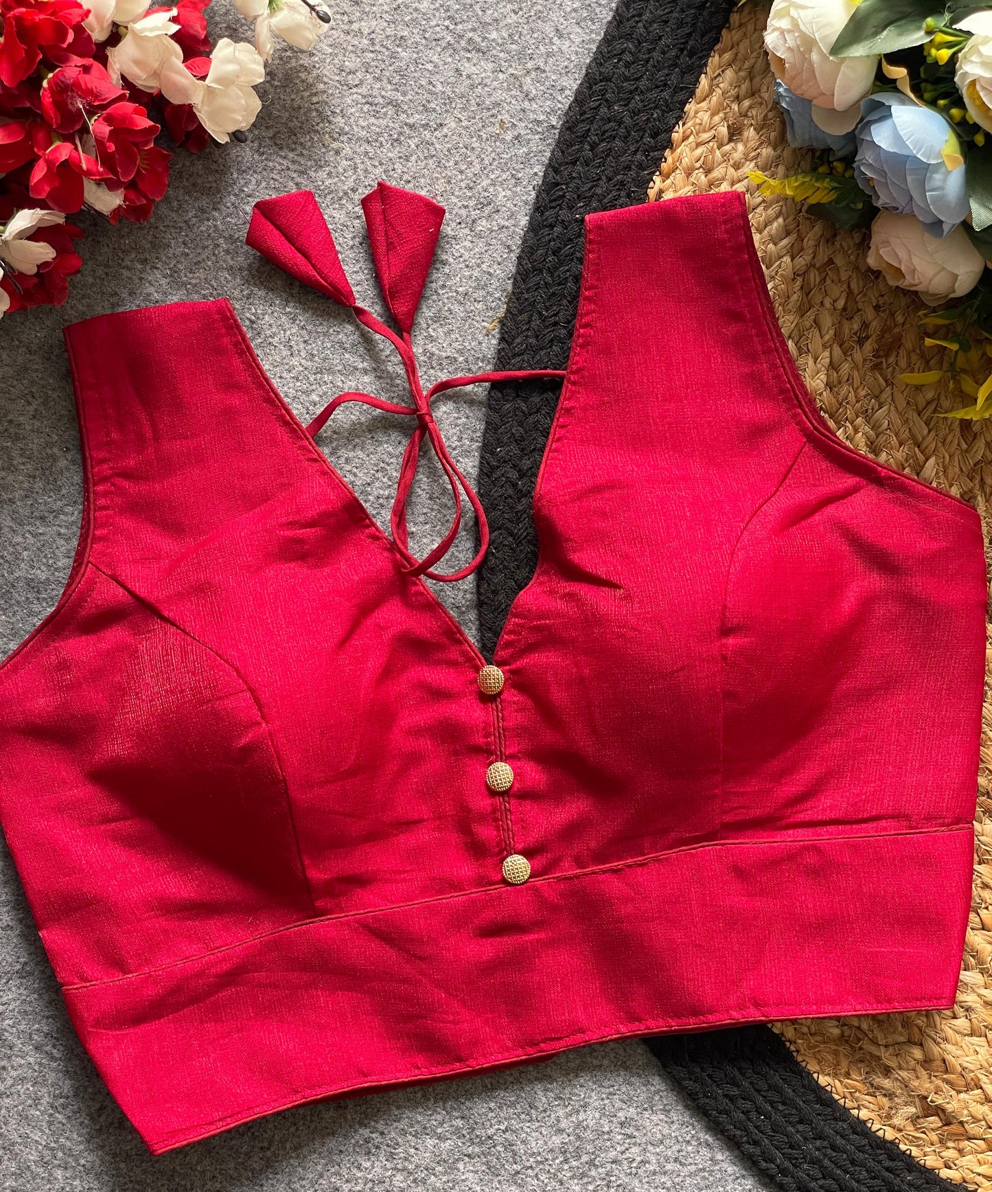 Readymade Sleeveless Blouse with Deep Neckline & Decorative Buttons