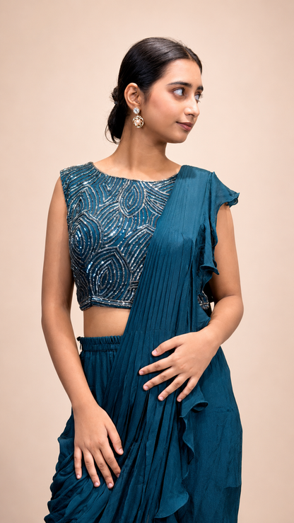 Teal Ruffle Pre‑Draped Saree with Embroidered Blouse