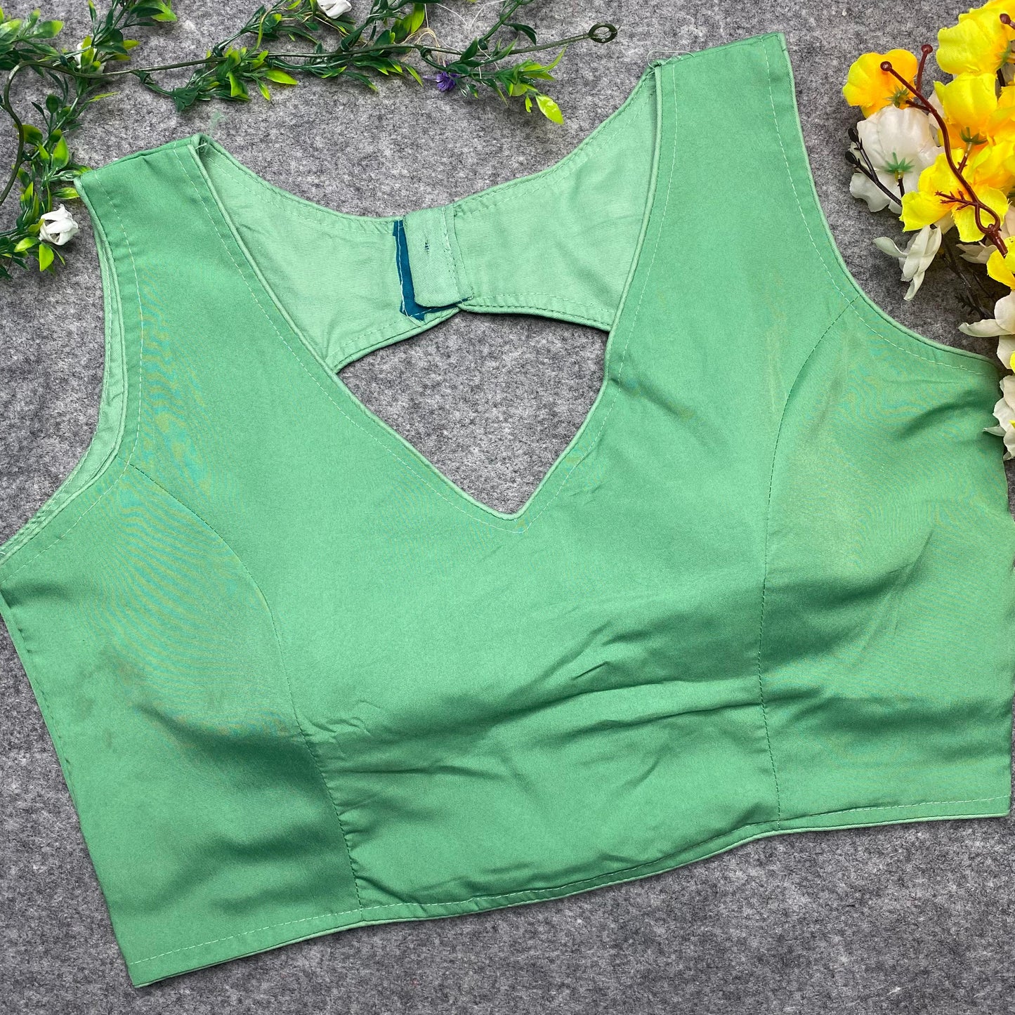 Semi-Satin Sleeveless Blouse Featuring Heart-Shaped Back Design