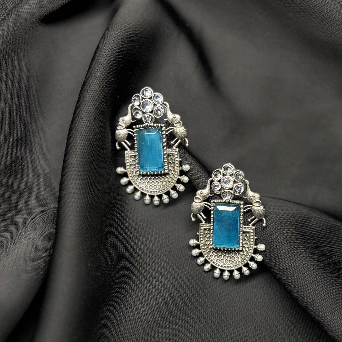 Oxidised German Silver Earrings with Sky Blue Stone & Elephant Motif