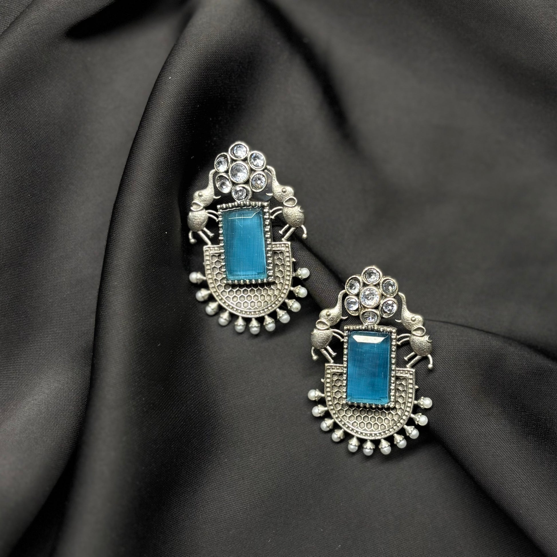 Oxidised German Silver Earrings with Sky Blue Stone & Elephant Motif