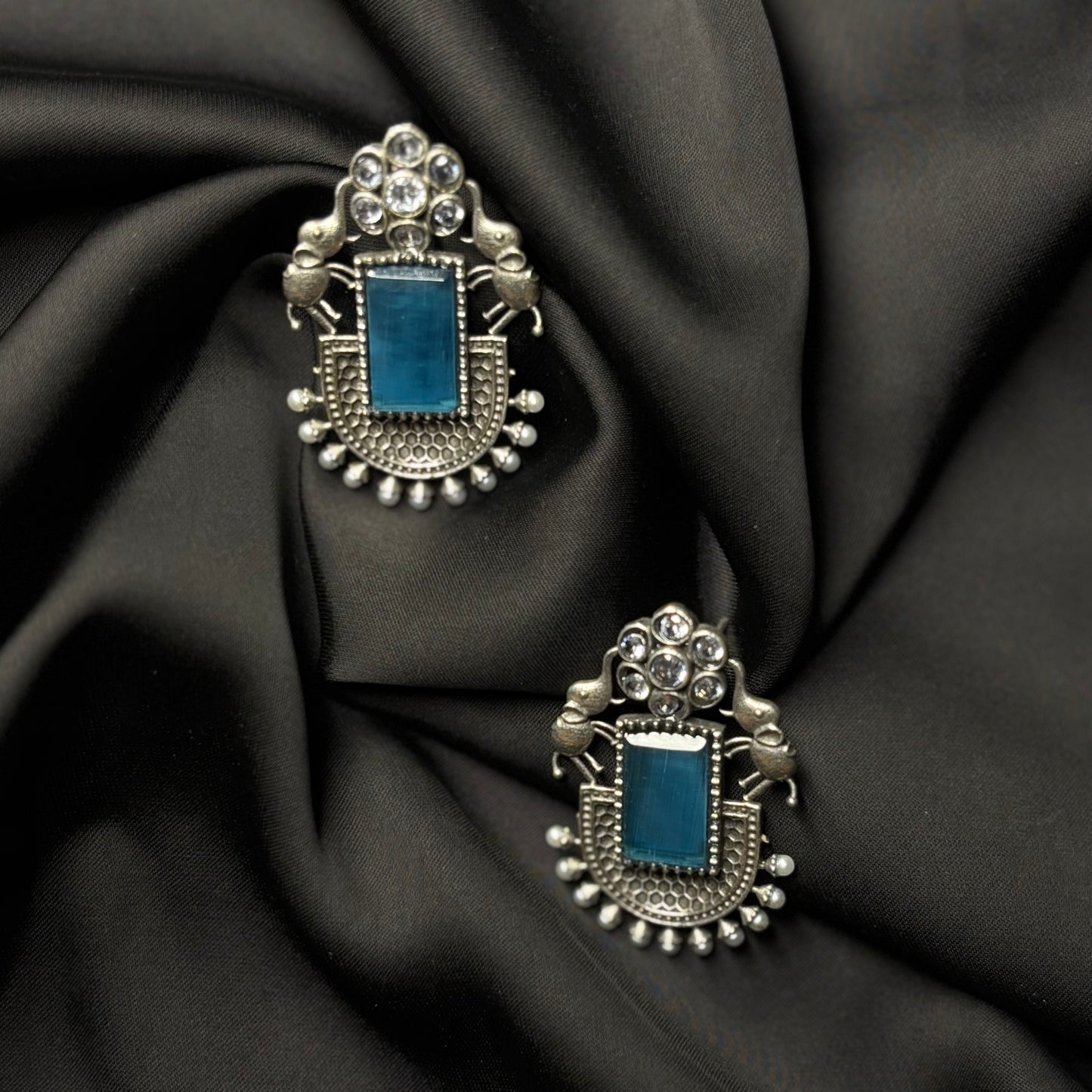 Oxidised German Silver Earrings with Sky Blue Stone & Elephant Motif