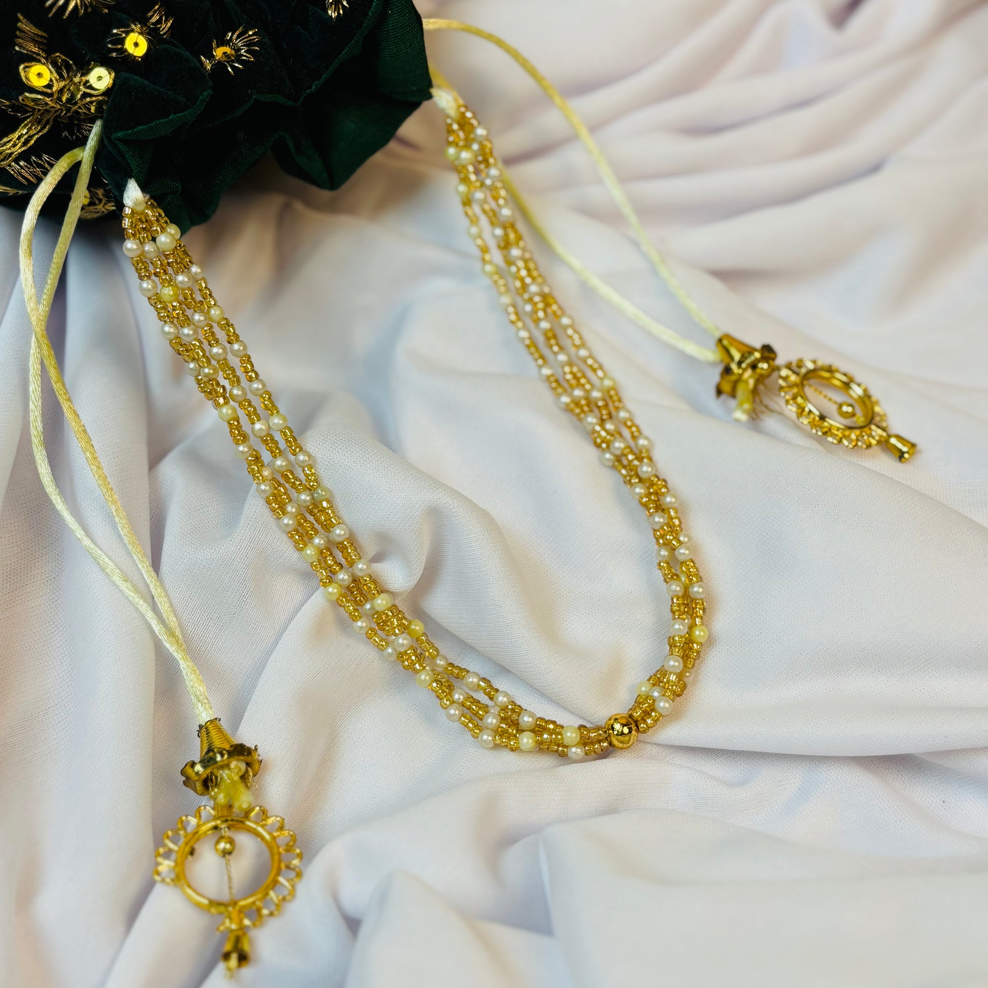 Royal Green Velvet Potli with Pearl Handle