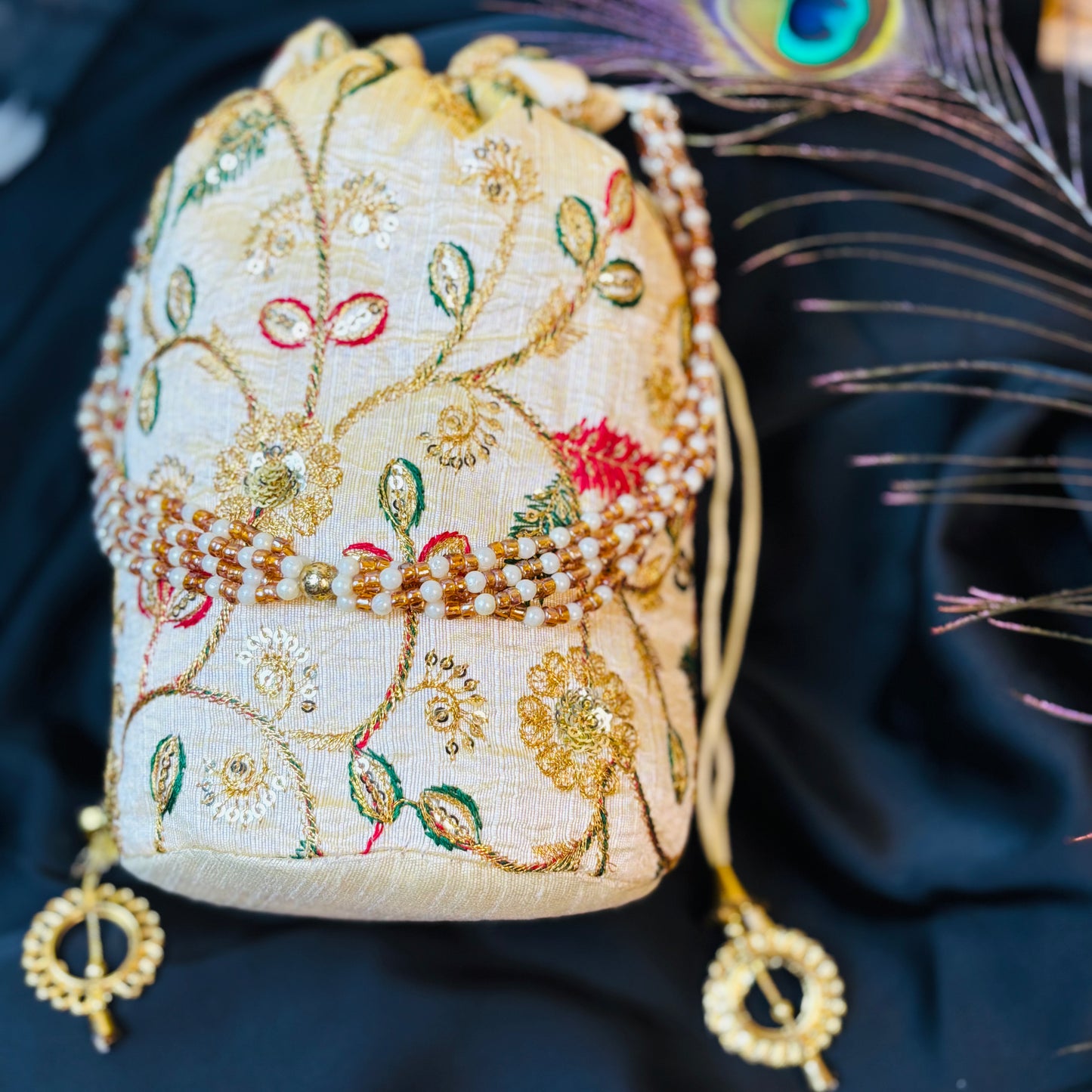Ivory Zari Embroidered Potli with Multicolor Floral Work & Pearl Handle