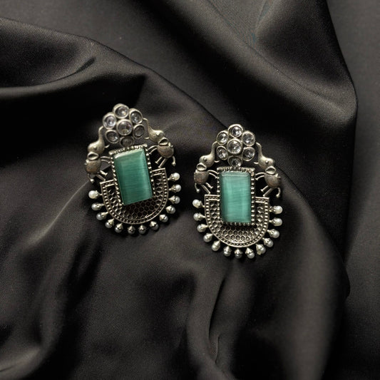 Oxidised German Silver Earrings with Light Green Stone & Elephant Motif