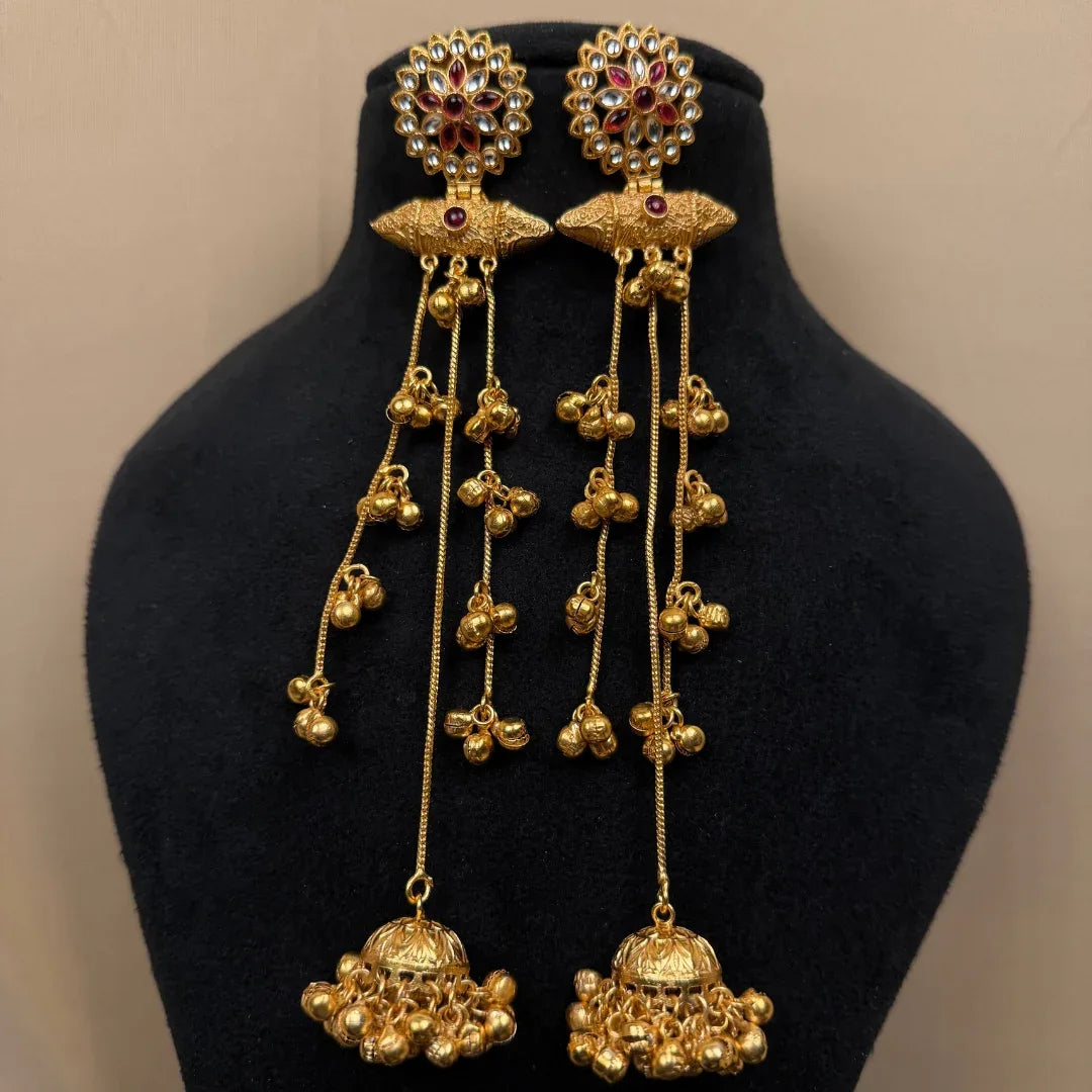 Traditional Gold Tone Jhumka Earrings with Red Stones