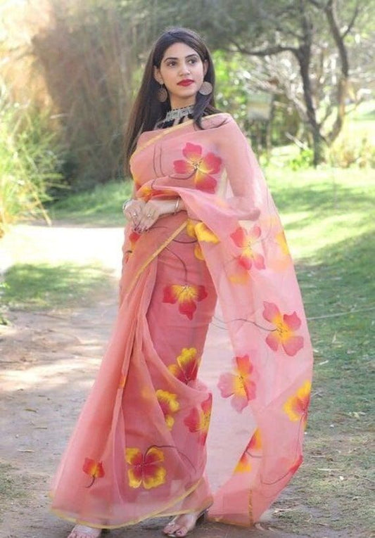 Peach-Pink Organza Saree with Vivid Floral Motifs