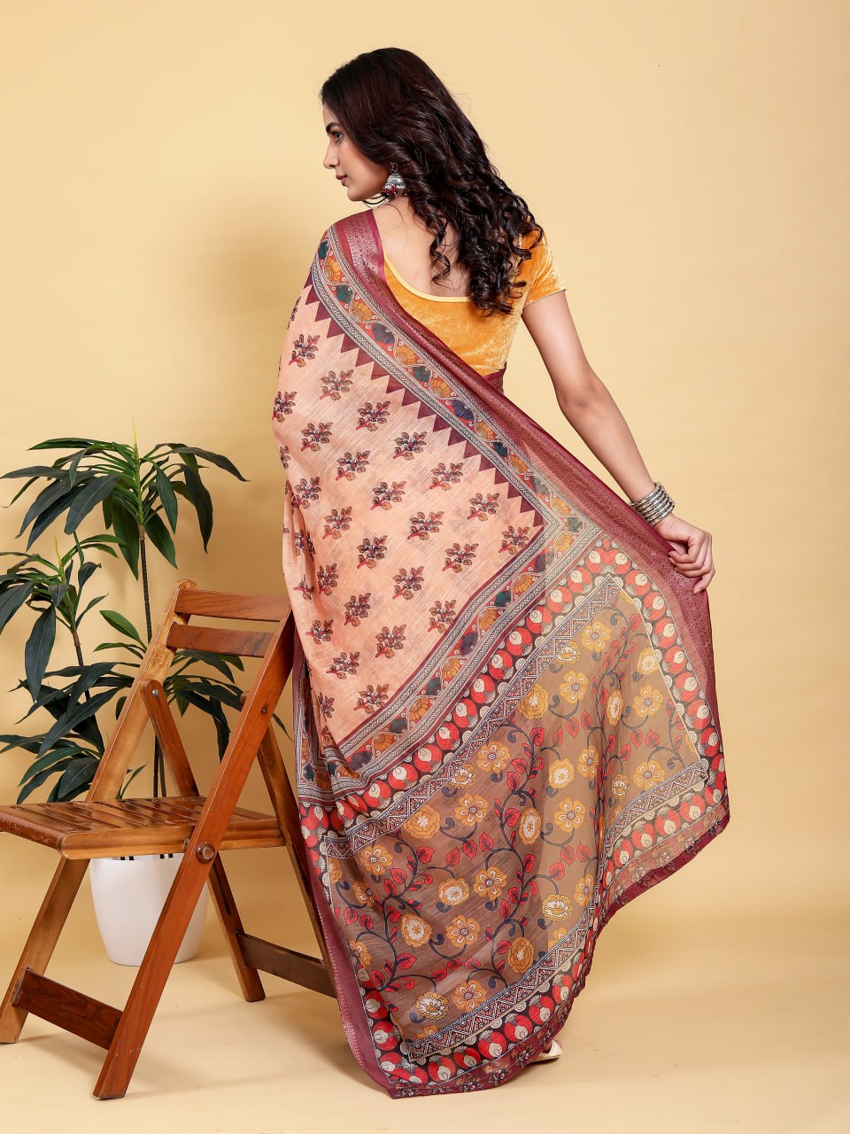 Elegant Peach/Coral Floral Print Saree with Maroon Zari Border